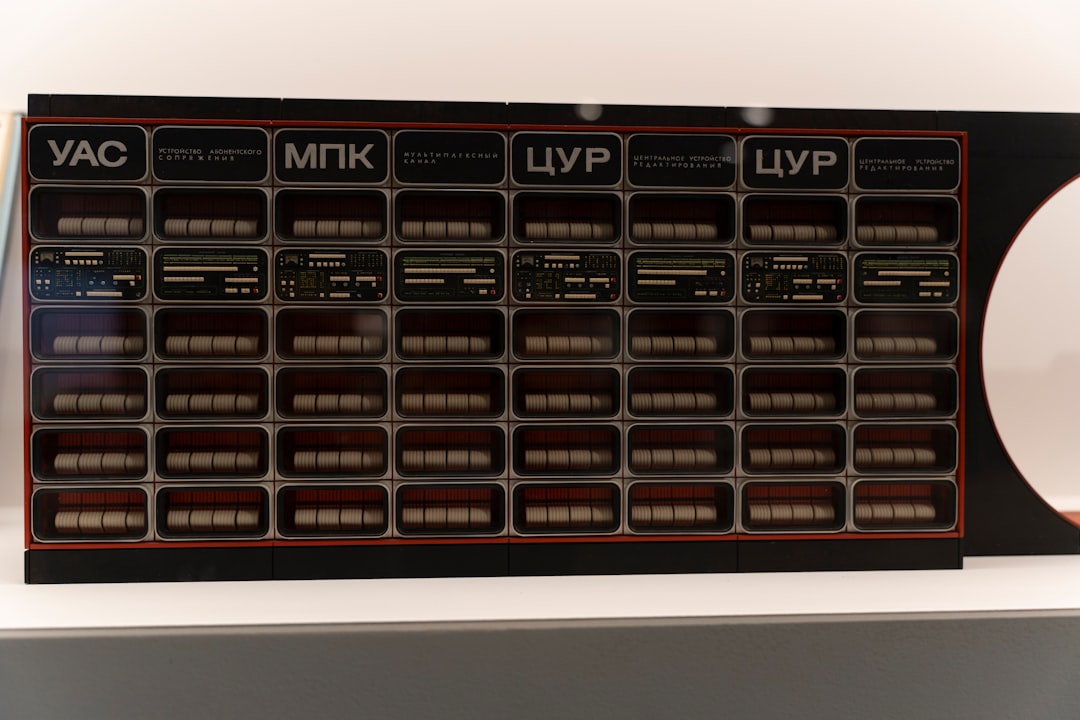 A rack of electronic components with labels.