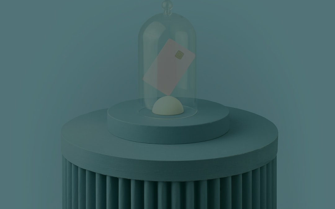 a bottle with a candle on top of it