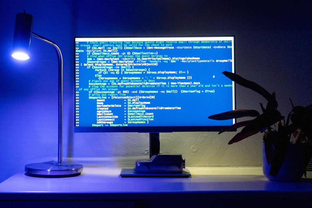 A computer screen displays lines of code.